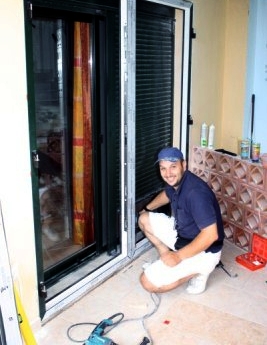 Stormmeister flood-resistant doors being fitted in Greece